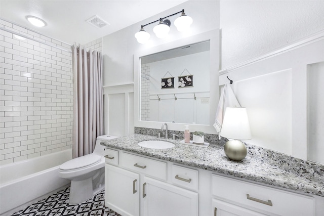 23706 Tristan Bay Ct, Spring, TX 77386 - full bath with vanity, shower / tub combo with curtain, and a wainscoted wall
