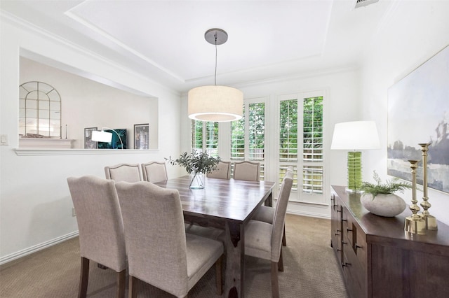 23706 Tristan Bay Ct, Spring, TX 77386 - carpeted dining space featuring a tray ceiling and baseboards