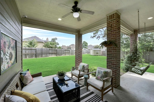 23706 Tristan Bay Ct, Spring, TX 77386 - fenced backyard with an outdoor hangout area, a patio area, ceiling fan, and a shed