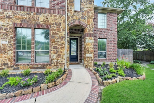 23706 Tristan Bay Ct, Spring, TX 77386 - doorway to property with stone siding and brick siding