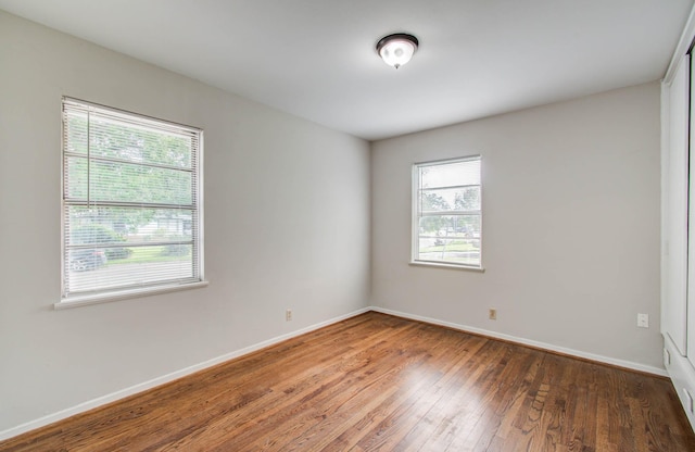 4921 Michael Dr, Houston, TX 77017 - unfurnished room with healthy amount of natural light and hardwood / wood-style floors
