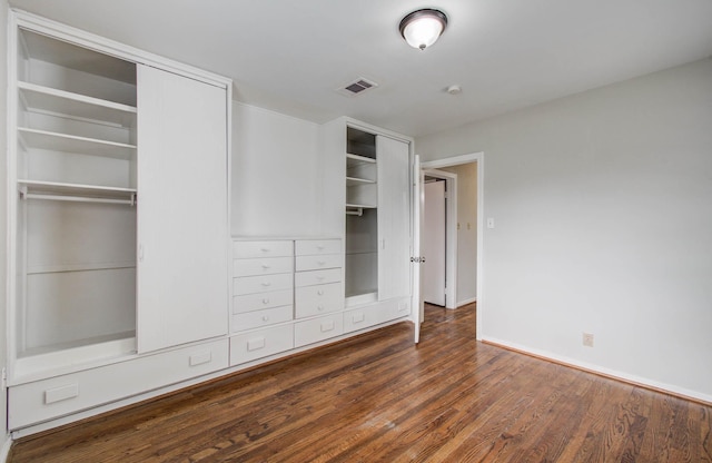 4921 Michael Dr, Houston, TX 77017 - unfurnished bedroom featuring wood finished floors and two closets