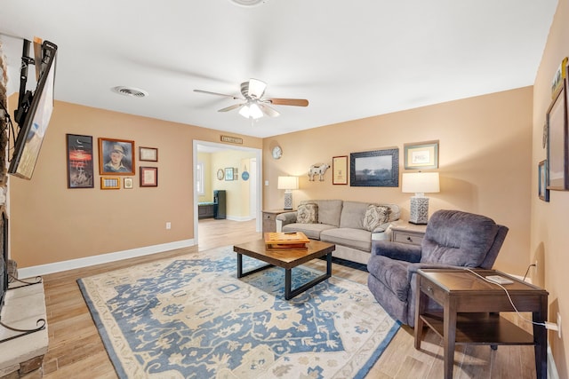 3211 County Road 237, Alvin, TX 77511 - living room featuring ceiling fan and light wood finished floors