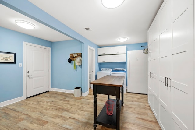 3211 County Road 237, Alvin, TX 77511 - office featuring light wood finished floors and washing machine and clothes dryer