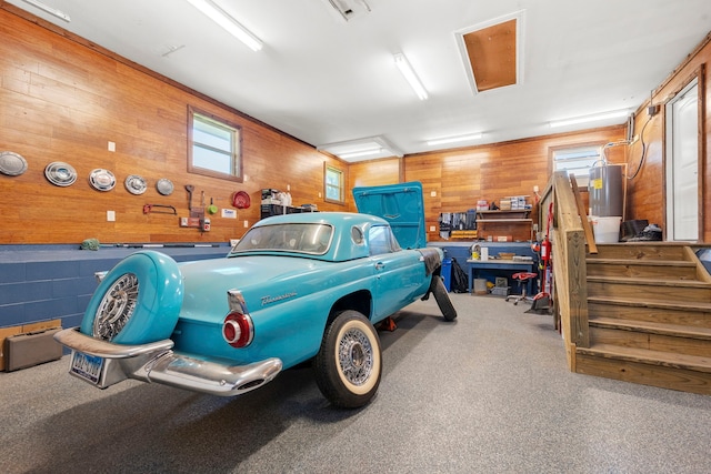 3211 County Road 237, Alvin, TX 77511 - garage with wood walls and water heater