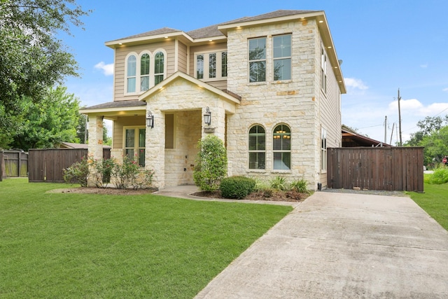 2502 S San Antonio Ave, Pearland, TX 77581 - view of front of house featuring stone siding, a shingled roof, and driveway