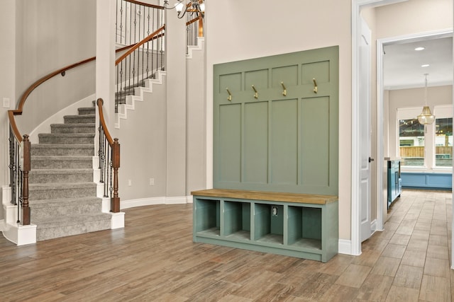 2502 S San Antonio Ave, Pearland, TX 77581 - mudroom featuring wood finished floors, a chandelier, and recessed lighting