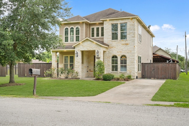 2502 S San Antonio Ave, Pearland, TX 77581 - view of front facade with stone siding, roof with shingles, and driveway