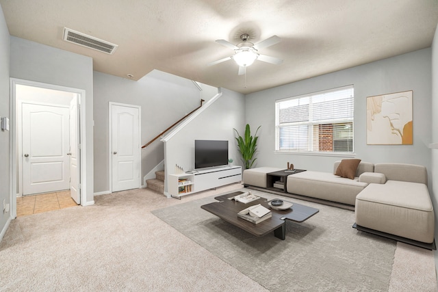 15515 Hinsdale Springs Ln, Houston, TX 77053 - living area featuring carpet, stairs, and ceiling fan
