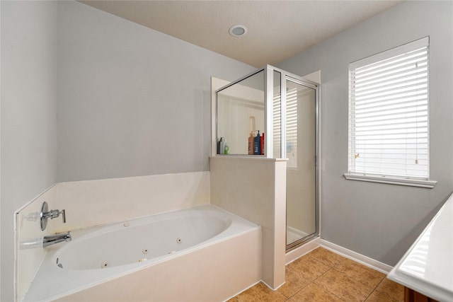 15515 Hinsdale Springs Ln, Houston, TX 77053 - full bath with a stall shower, a whirlpool tub, and tile patterned flooring