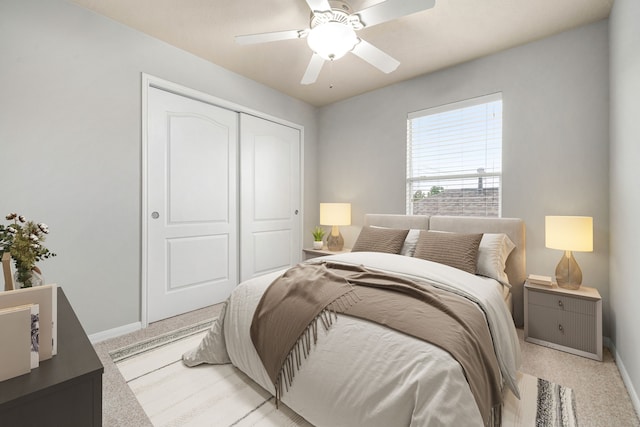 15515 Hinsdale Springs Ln, Houston, TX 77053 - bedroom with light colored carpet, a closet, and ceiling fan