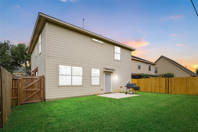 15515 Hinsdale Springs Ln, Houston, TX 77053 - back of house featuring a gate, a patio, and a fenced backyard