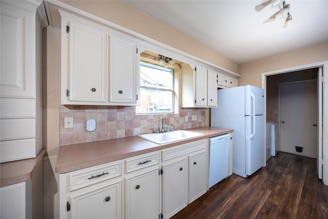 15111 Silverman St, Houston, TX 77598 - kitchen featuring white appliances, tasteful backsplash, white cabinets, and dark wood-style floors