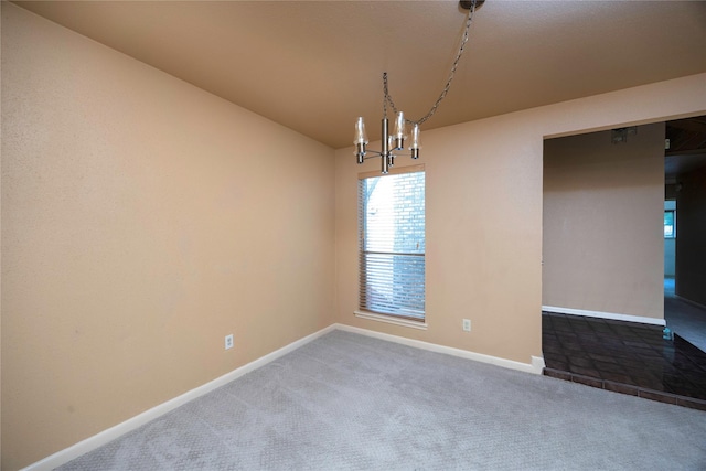 15111 Silverman St, Houston, TX 77598 - carpeted empty room featuring a chandelier and baseboards
