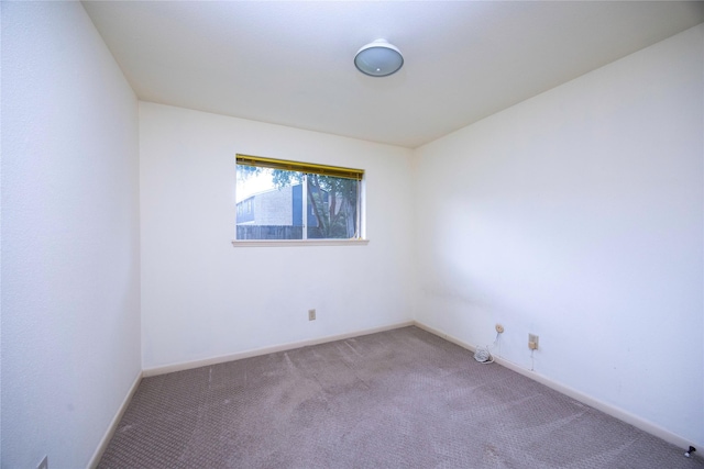 15111 Silverman St, Houston, TX 77598 - carpeted empty room with baseboards