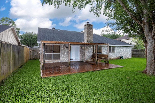 15111 Silverman St, Houston, TX 77598 - rear view of property with a wooden deck, a shingled roof, a chimney, brick siding, and a fenced backyard