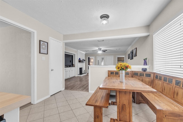 3302 Candlelon Dr, Spring, TX 77388 - dining area with light tile patterned floors, a ceiling fan, and crown molding