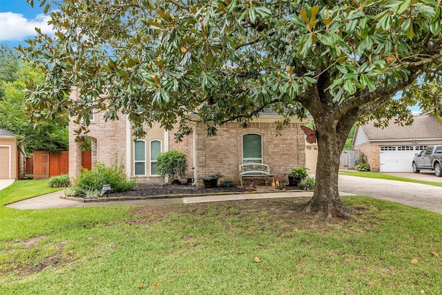 3302 Candlelon Dr, Spring, TX 77388 - obstructed view of property with driveway, brick siding, and a garage