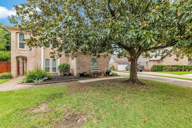 3302 Candlelon Dr, Spring, TX 77388 - obstructed view of property with curved driveway and brick siding