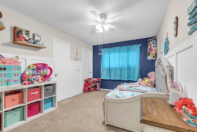 3302 Candlelon Dr, Spring, TX 77388 - carpeted bedroom with a textured ceiling and a ceiling fan