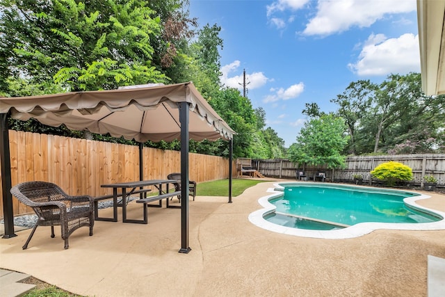 3302 Candlelon Dr, Spring, TX 77388 - view of swimming pool featuring a patio, a fenced backyard, and a pool with connected hot tub