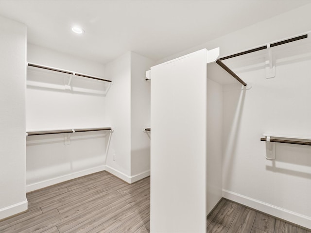 1109 Robbie St, Houston, TX 77009 - spacious closet featuring wood finished floors