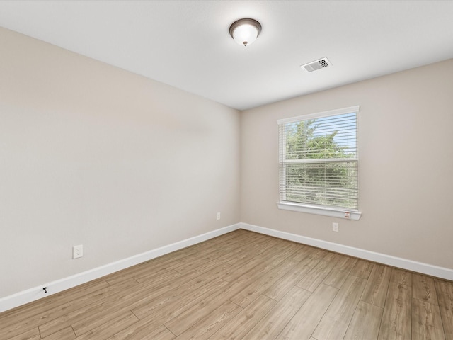 1109 Robbie St, Houston, TX 77009 - empty room with baseboards and light wood-style floors