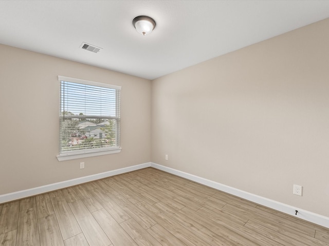 1109 Robbie St, Houston, TX 77009 - empty room with baseboards and light wood-style floors