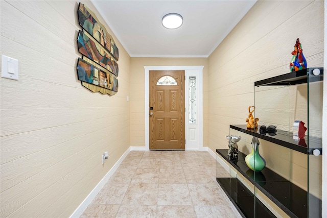 478 Brandon Rd, Conroe, TX 77302 - foyer entrance featuring wood walls and ornamental molding