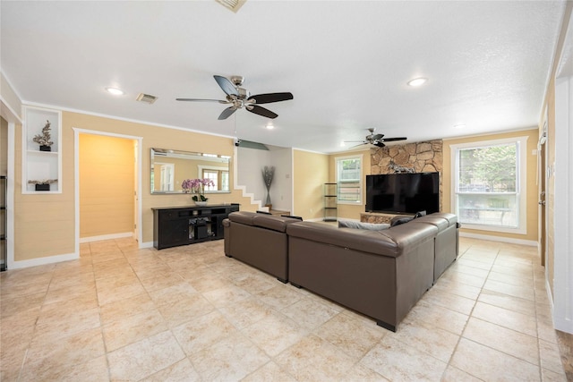478 Brandon Rd, Conroe, TX 77302 - living area with a ceiling fan, recessed lighting, light tile patterned flooring, and crown molding