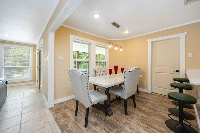 478 Brandon Rd, Conroe, TX 77302 - dining space featuring ornamental molding, healthy amount of natural light, wood finished floors, and recessed lighting