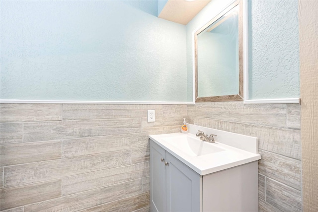 478 Brandon Rd, Conroe, TX 77302 - bathroom featuring vanity and a textured wall