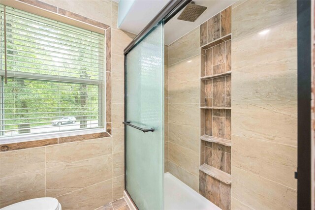 478 Brandon Rd, Conroe, TX 77302 - bathroom with a tile shower and toilet