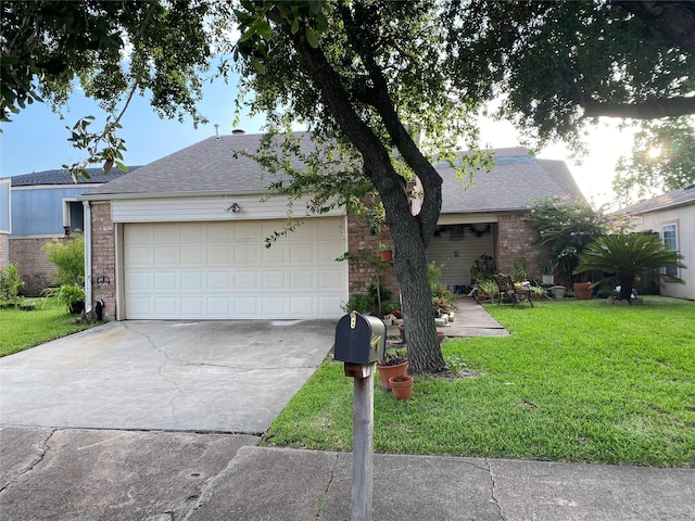 4410 Wildacres Dr, Houston, TX 77072 - view of front of house featuring concrete driveway, a front yard, a garage, roof with shingles, and brick siding