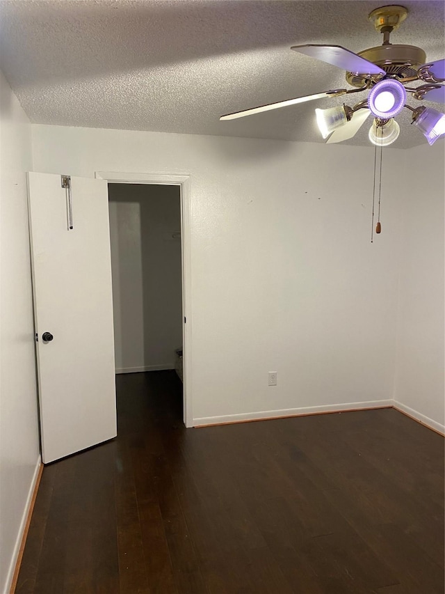 4410 Wildacres Dr, Houston, TX 77072 - unfurnished room with ceiling fan, wood finished floors, and a textured ceiling