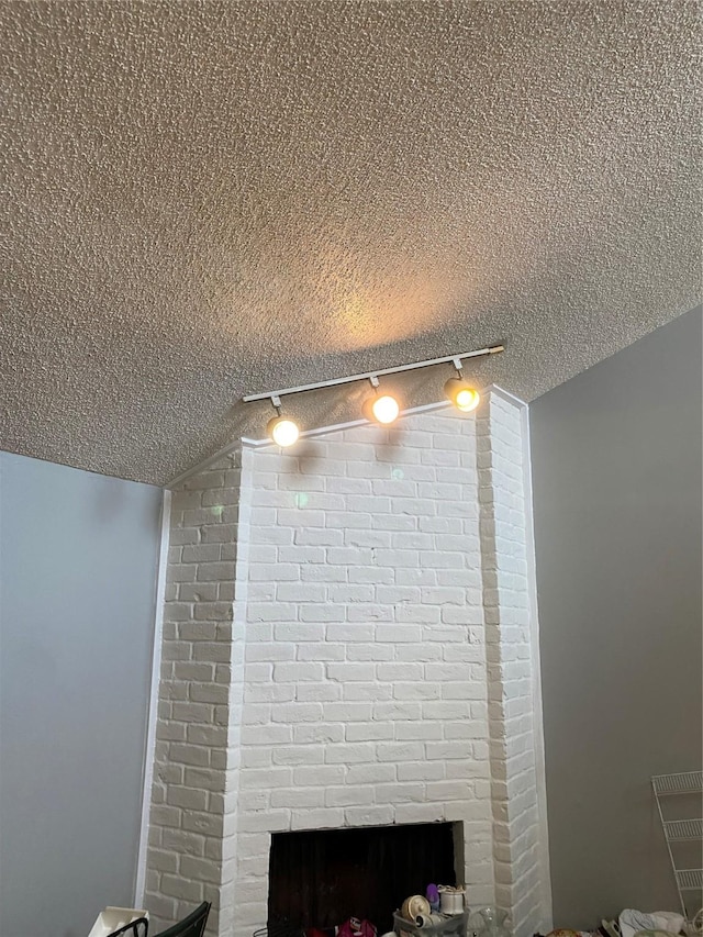 4410 Wildacres Dr, Houston, TX 77072 - detailed view of a textured ceiling and a fireplace
