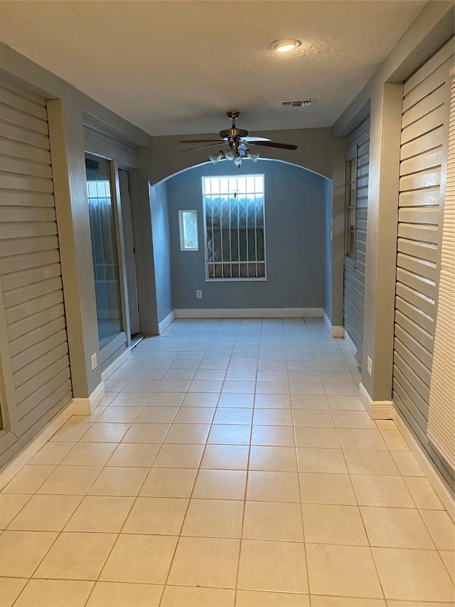 4410 Wildacres Dr, Houston, TX 77072 - spare room featuring a ceiling fan and light tile patterned floors