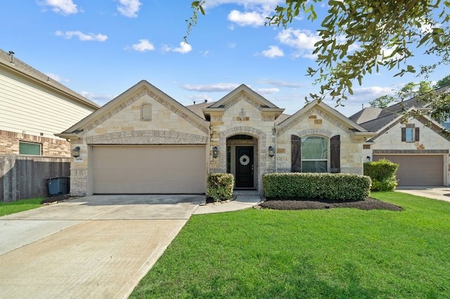 14510 Kasey Flowers Ct, Humble, TX 77396 - french country home with stone siding, driveway, and a garage