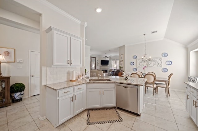 14510 Kasey Flowers Ct, Humble, TX 77396 - kitchen featuring stainless steel dishwasher, a ceiling fan, light tile patterned floors, a peninsula, and white cabinetry
