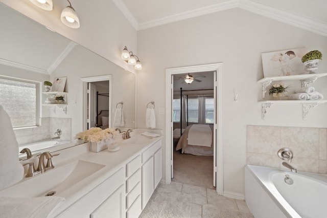 14510 Kasey Flowers Ct, Humble, TX 77396 - ensuite bathroom featuring vaulted ceiling, double vanity, a garden tub, and tile patterned floors