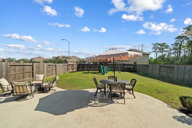 14510 Kasey Flowers Ct, Humble, TX 77396 - fenced backyard featuring a patio area and a playground