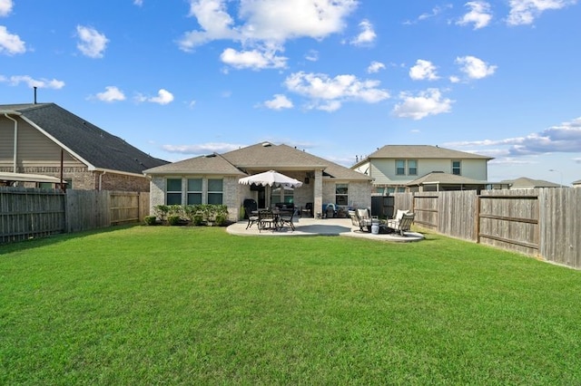 14510 Kasey Flowers Ct, Humble, TX 77396 - rear view of property featuring a patio and a fenced backyard