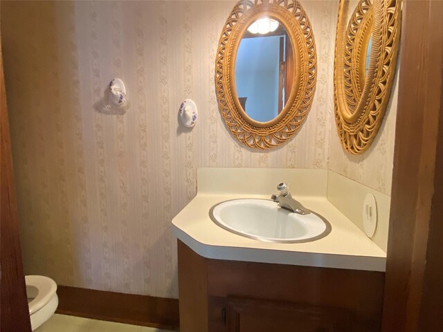 222 N 1st, Wallis, TX 77485 - half bath with wallpapered walls and vanity