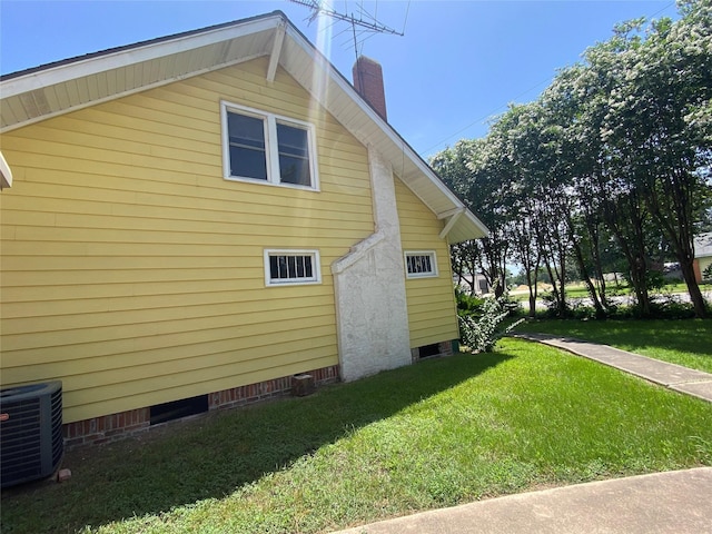 222 N 1st, Wallis, TX 77485 - view of side of home with a yard, a chimney, and crawl space