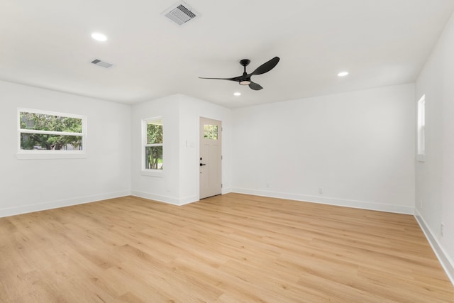 2307 Scott St, La Marque, TX 77568 - spare room featuring ceiling fan, light wood-type flooring, and recessed lighting