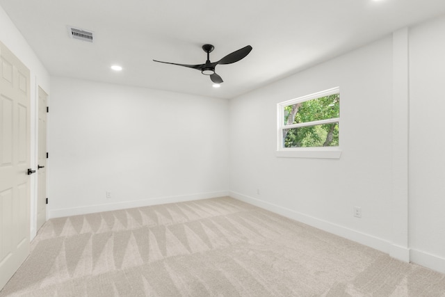 2307 Scott St, La Marque, TX 77568 - empty room with a ceiling fan, light colored carpet, and recessed lighting