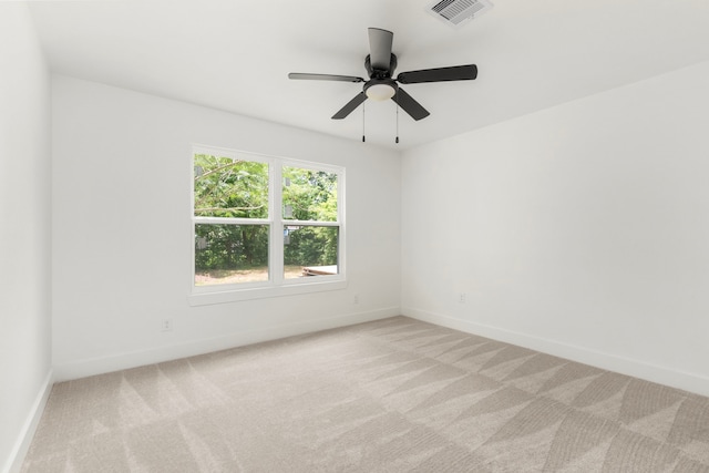 2307 Scott St, La Marque, TX 77568 - empty room featuring light carpet and ceiling fan