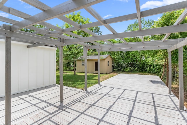 2307 Scott St, La Marque, TX 77568 - view of patio / terrace with a pergola, a wooden deck, and a shed