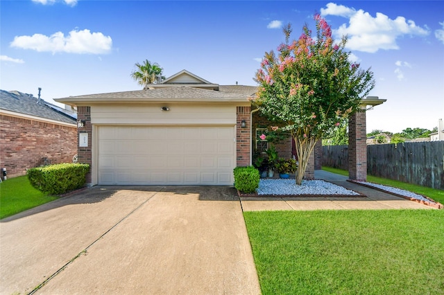 2014 Fisher Trace Ct, Spring, TX 77373 - view of front of home with concrete driveway, brick siding, and a garage