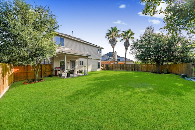2014 Fisher Trace Ct, Spring, TX 77373 - fenced backyard with a patio area